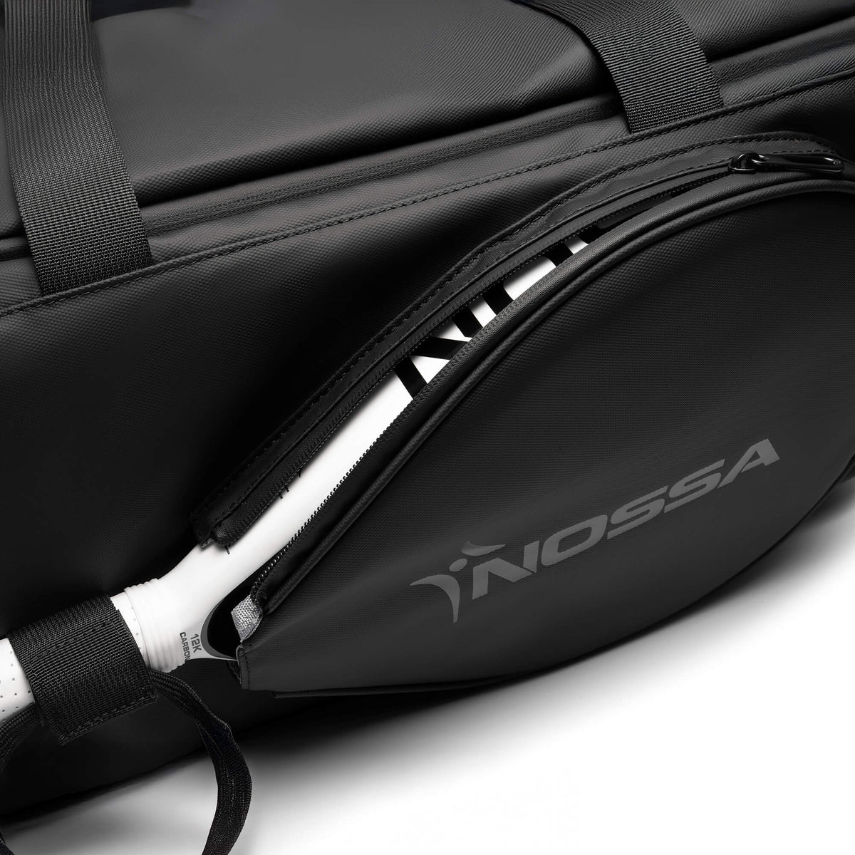 Close-up of the NOSSA logo and racket sleeve on the HYBRID rucksack