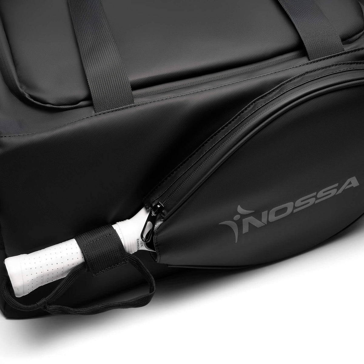 Racket compartment on the NOSSA Padel HYBRID rucksack with racket handle showing
