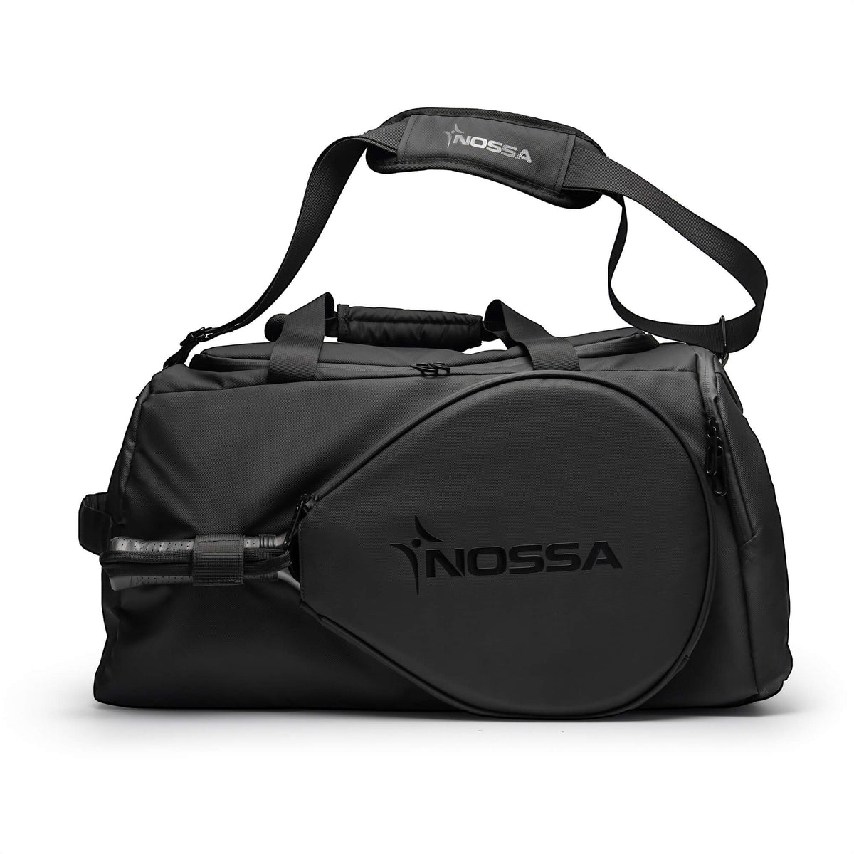 NOSSA Padel HYBRID rucksack in black, carried as a holdall with shoulder strap