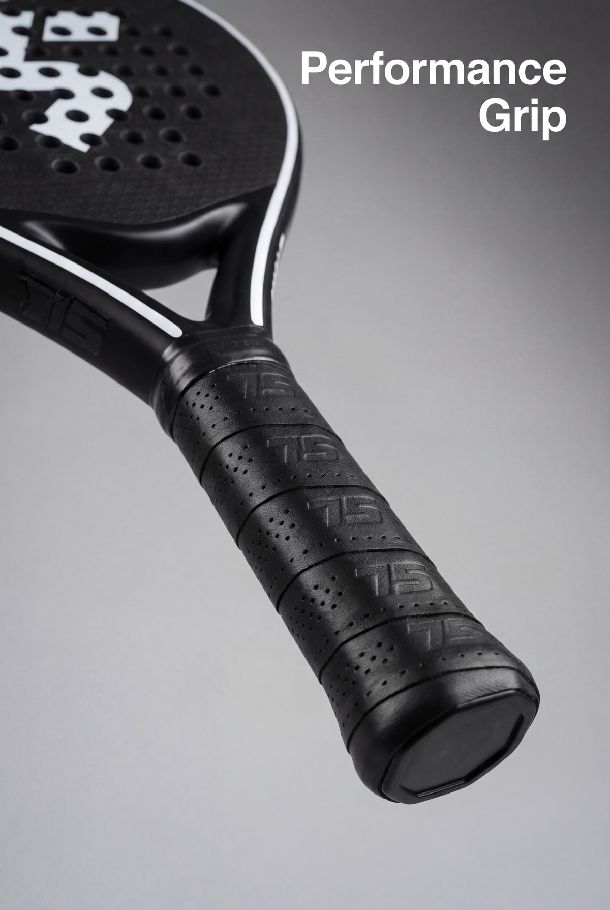 Close-up of the black performance grip on the Third Shot 12K carbon padel racket