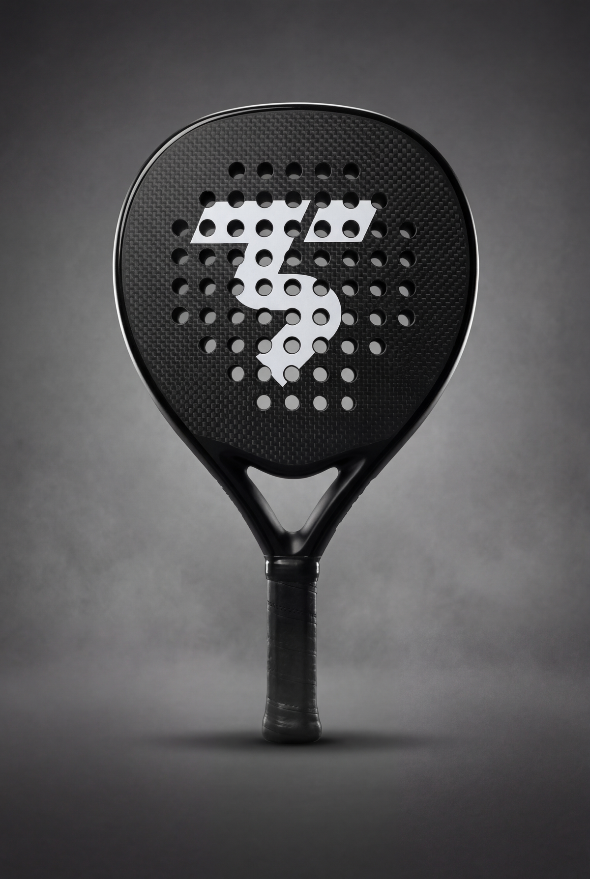 Third Shot 12K carbon padel racket on a dark background